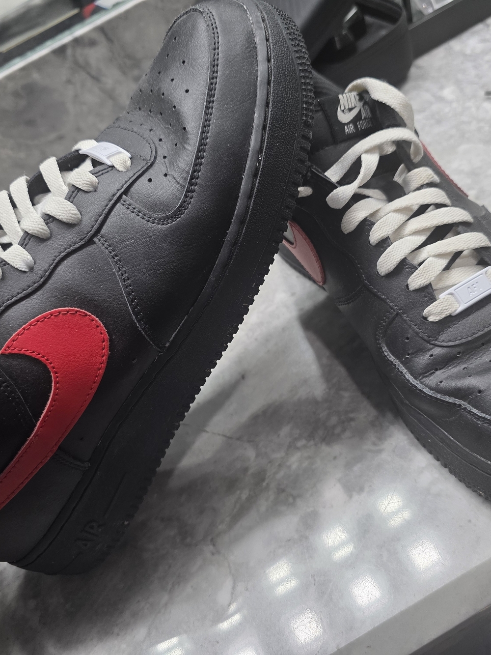 Nike Air Force 1 Low — Black with Red Swoosh
